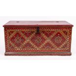 AN INDIAN POLYCHROME PAINTED BLANKET BOX with lozenge mirrored panels inset to the front, on