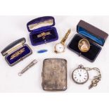 A CONTINENTAL WHITE METAL LADIES FOB WATCH with engraved back, two brooches, a 9ct gold ladies wrist