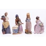 FOUR LLADRO PORCELAIN FIGURINES to include model numbers 2258, 2324 and 2357