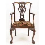 A CHIPPENDALE STYLE MAHOGANY OPEN ARMCHAIR with a pierced splat back, scrolling acanthus arms and
