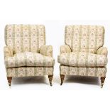 A PAIR OF MID TO LATE 20TH CENTURY HOWARD CHAIRS LIMITED ARMCHAIRS with striped floral upholstery,