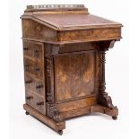 A VICTORIAN WALNUT DAVENPORT the brass galleried top loose, with drawers to the side 56cm wide x