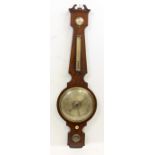 A 19TH CENTURY MAHOGANY DIAL BAROMETER the silvered dial thermometer, hydrometer and level, all in a
