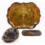 A VICTORIAN PAINTED AND LACQUERED TIN TRAY of serpentine outline, decorated with an urn containing