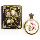 A 19TH CENTURY PORCELAIN SCENT BOTTLE with a white metal top and hand painted floral decoration, 7cm