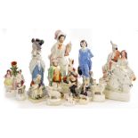 A GROUP OF STAFFORDSHIRE POTTERY to include Falstaff figurine 25cm high, two Staffordshire flat back