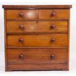 A VICTORIAN MAHOGANY CHEST of two short and three long drawers with turned knob handles 106.5cm wide