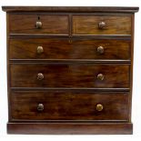 A VICTORIAN MAHOGANY CHEST OF TWO SHORT AND THREE LONG DRAWER with turned knob handles and a