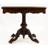 AN EARLY VICTORIAN ROSEWOOD FOLD OVER CARD TABLE with carved scrolling decoration, 91cm wide x 45.