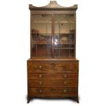 AN EDWARDS & ROBERTS MAHOGANY SECRETAIRE BOOKCASE with marquetry inlaid decoration with astrigal