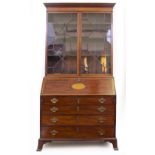 A GEORGE III MAHOGANY AND SATINWOOD CROSSBANDED BUREAU BOOKCASE with twin astrigal glazed doors