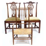 A PAIR OF 19TH CENTURY CHIPPENDALE STYLE DINING CHAIRS with pierced splat backs and inset seats each