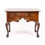 An ANTIQUE BURR WALNUT OAK LOW BOY with three drawers, scrolling undertier and cabriole legs with