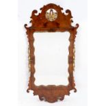 A GEORGIAN STYLE WALNUT FRET FRAMED WALL MIRROR 49cm wide x 97cm high