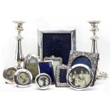 A QUANTITY OF EARLY 20TH CENTURY AND LATER SILVER PICTURE FRAMES the largest 17cm x 22cm together