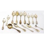 A SELECTION OF SILVER FIDDLE PATTERN CUTLERY to include four large serving spoons, a soup ladle,
