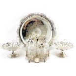 A SILVER CONDIMENT SET 18cm diameter, a silver plated tray and two silver plated bon bon dishes