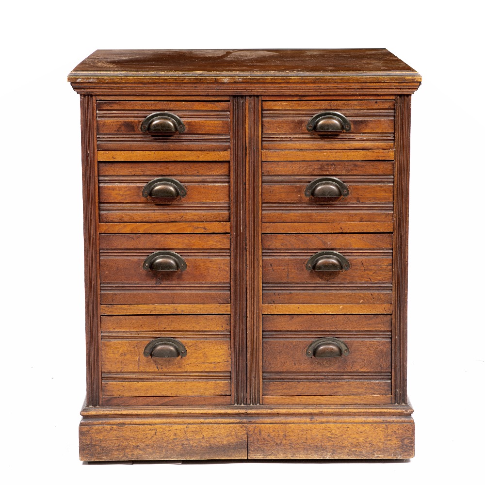 A LATE 19TH / EARLY 20TH CENTURY WALNUT CHEST OF EIGHT DRAWERS on a plinth base 70cm wide x 60cm