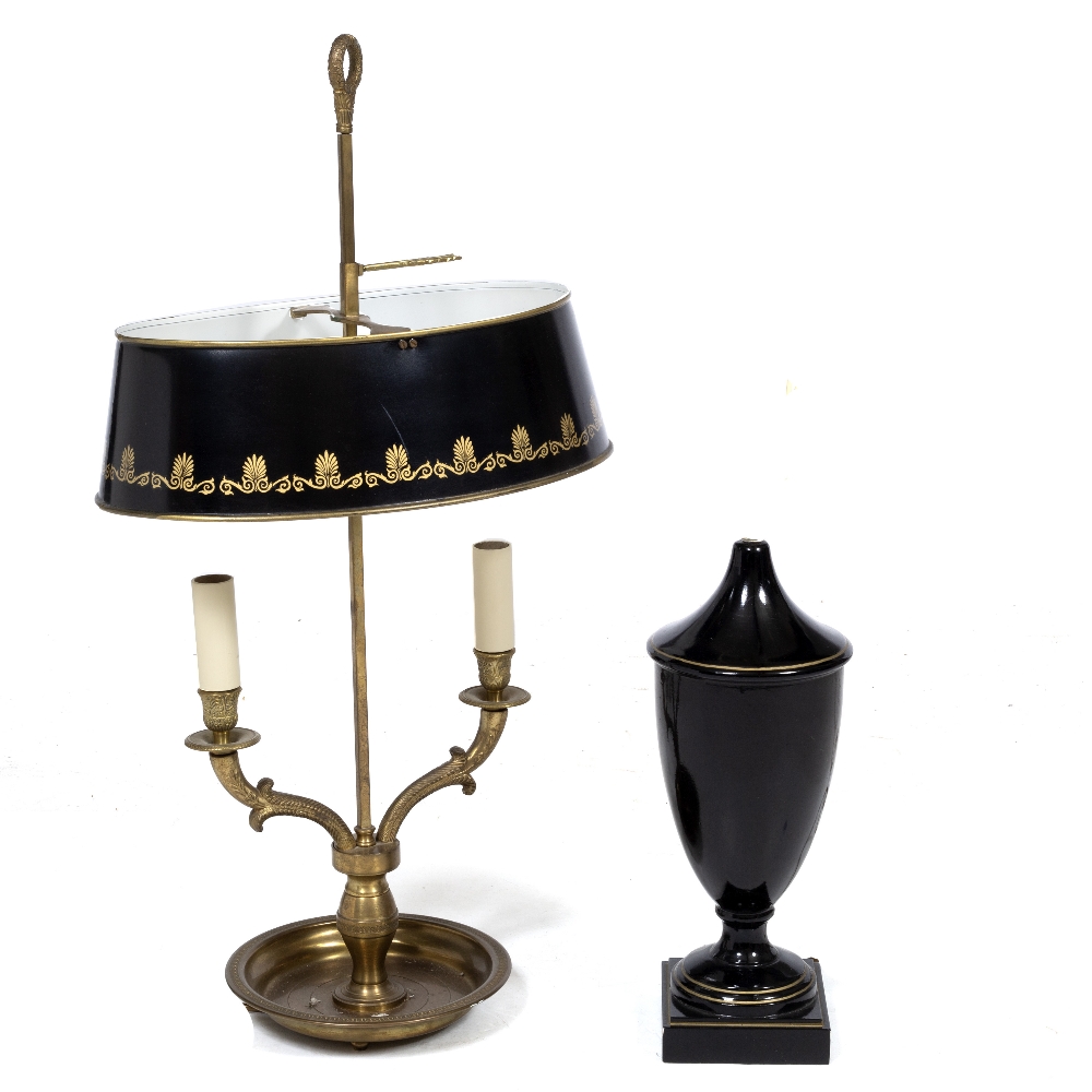 AN EMPIRE STYLE BRASS BOUILLOTTE TWIN BRANCH TABLE LAMP with painted toleware shade and circular