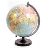 A 20TH CENTURY TERRESTRIAL MODEL GLOBE on stand 46cm high approximately