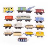 A COLLECTION OF 15 PIECES OF HORNBY 'O' GAUGE ROLLING STOCK to include LMS and advertising items,