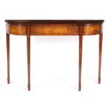 A BOW FRONTED GEORGIAN STYLE HALL TABLE standing on square tapering legs 123cm wide x 37cm deep x