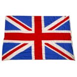A LARGE UNION FLAG in linen with embroidered panel decoration 330cm across x 220cm across