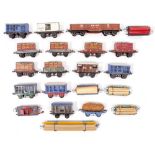 A GROUP OF 21 HORNBY 'O' GAUGE WAGONS of various sorts to include a ten-ton crane, lumber wagons