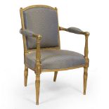 A CONTEMPORARY FRENCH STYLE FAUTEUIL with painted gilt frame and blue and yellow overstuffed seat,