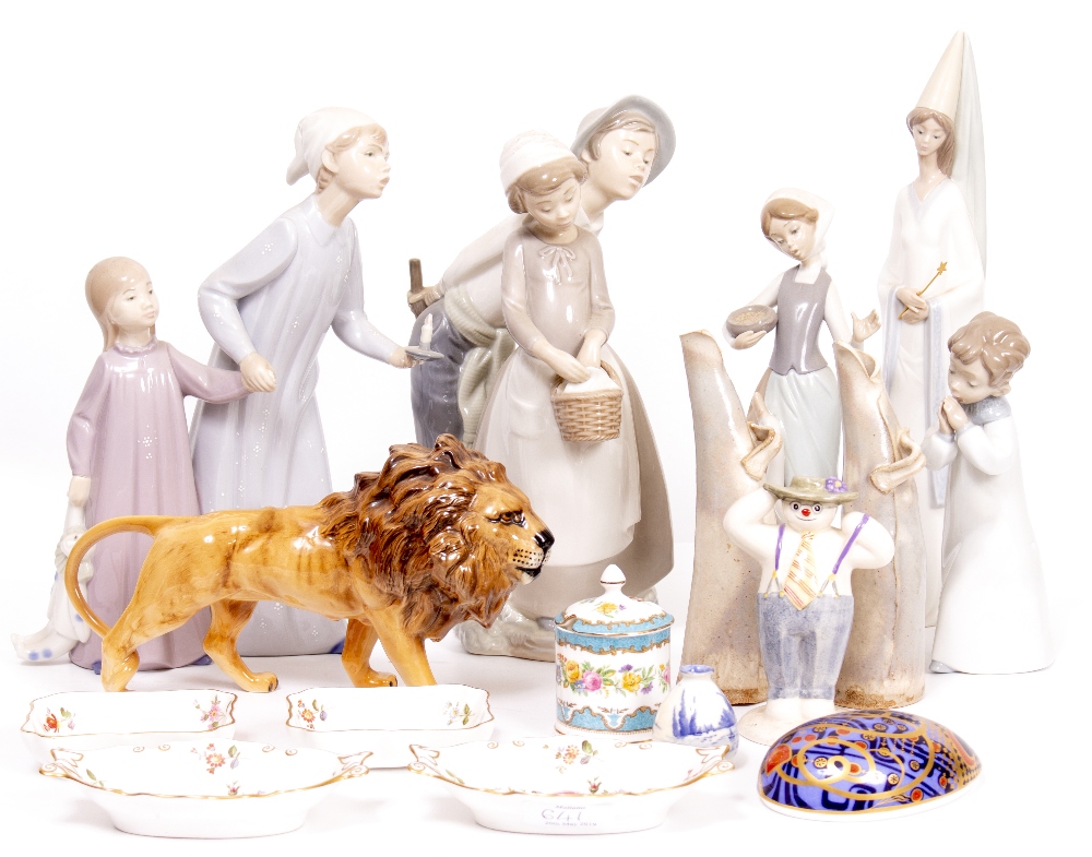 A SELECTION OF NAO AND LLADRO PORCELAIN FIGURES a Beswick lion, studio pottery vases, pin dishes,