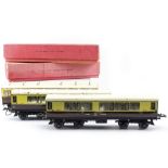 A GROUP OF THREE HORNBY SERIES GWR 'O' GAUGE CORRIDOR COACHES 29.5cm long together with a further