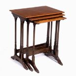 A NEST OF THREE WALNUT OCCASIONAL TABLES with rectangular tops, each with quartered burrwood