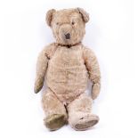 AN EARLY 20TH CENTURY MOHAIR TEDDY BEAR (POSSIBLY STEIFF OR BING) with stitched eyes, nose and