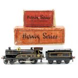 A HORNBY SERIES CLOCKWORK 4-4-0 LMS LOCOMOTIVE No. 2711 complete with tender and in black livery