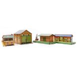 A HORNBY SERIES TIN PLATE ENGINE SHED with double opening doors 27.5cm long together with a