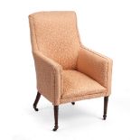 A GEORGIAN STYLE UPHOLSTERED ARMCHAIR with reeded legs 63cm wide x 66cm deep x 103cm high