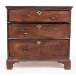 AN 17TH CENTURY OAK CHEST of three long drawers raised on bracket feet 94cm wide x 57cm deep x