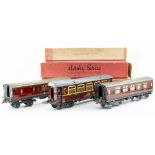 TWO HORNBY 'O' GAUGE LMS CORRIDOR COACHES and complete with one box, together with a Hornby 'o'