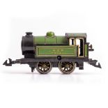 A BING 'O' GAUGE CLOCKWORK LNER 0-4-0 TANK LOCOMOTIVE NO. 4993 in green livery 15.5cm long buffer to