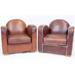 A NEAR PAIR OF ART DECO STYLE RED LEATHER UPHOLSTERED ARMCHAIRS each 82cm wide x 80cm deep x 78cm