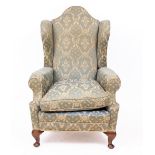 A GEORGIAN STYLE WING BACK UPHOLSTERED ARMCHAIR 76cm wide x 77cm deep x 130cm high