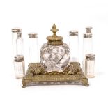 A SELECTION OF SILVER TOPPED DRESSING TABLE JARS AND REQUISITES to include scent bottle and a