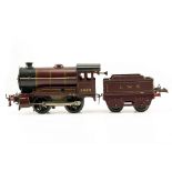 A HORNBY 'O' GAUGE CLOCKWORK 0-4-0 LMS LOCOMOTIVE and tender no. 5600, 27cm long overall