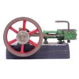 A SCALE MODEL SINGLE CYLINDER STEAM ENGINE 21cm long, the fly wheel 10cm diameter