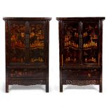 A PAIR OF CHINESE LACQUERED CABINETS the twin panelled doors opening to reveal a shelf and lidded