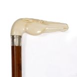 A VICTORIAN MALACCA WALKING CANE with an ivory 'L' shaped handle in the form of a horses head and