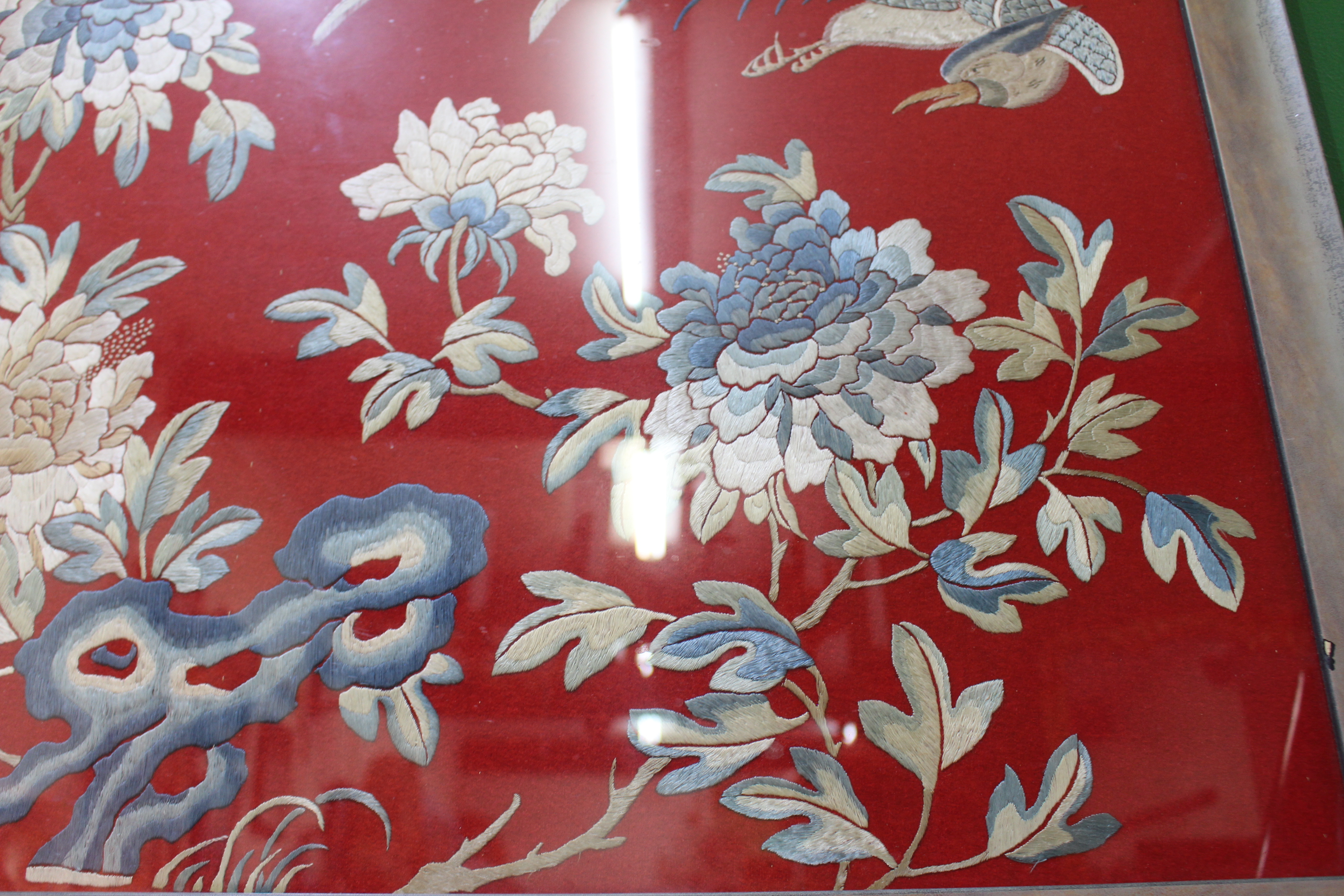 A CHINESE EMBROIDERED PANEL of phoenix amongst branches and flowers on a red felt ground, 56cm x - Image 7 of 10