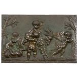 A CAST BRONZE SCULPTURAL RELIEF PANEL depicting putti enacting a bacchanalian procession, one riding