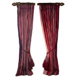 A PAIR OF PURPLE AND RED STRIPED INTERLINED CURTAINS each 250cm high and approximately 590cm long