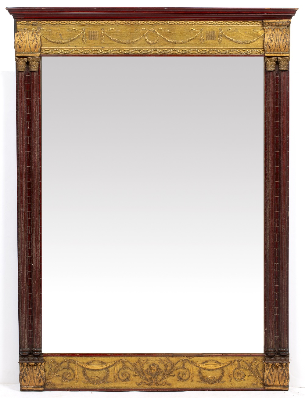 A 19TH CENTURY PARCEL GILT AND PAINTED RECTANGULAR WALL MIRROR of architectural form with fluted